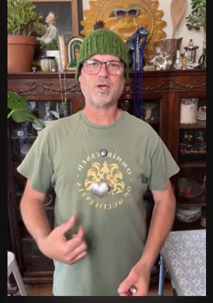 The host on camera during a live Ravens Chest jewelry auction co-hosted by TalonBot